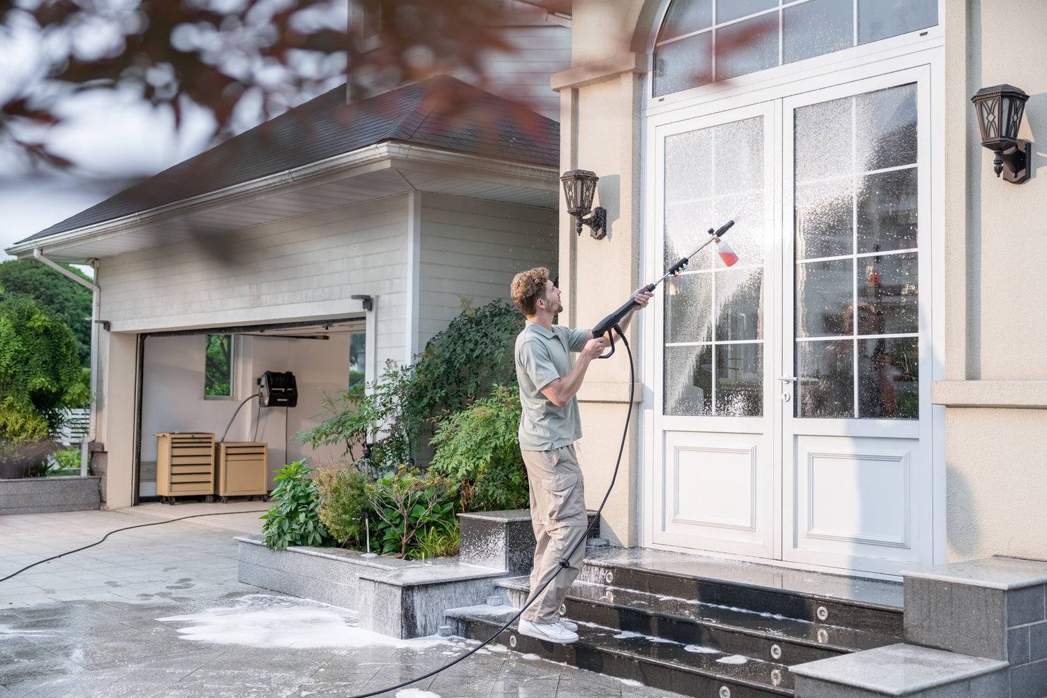 Pressure washing exterior home structures