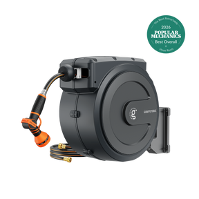 Giraffe Tools Retractable Garden Hose Reel 5/8in 90ft with wall mount, hose, and nozzle.