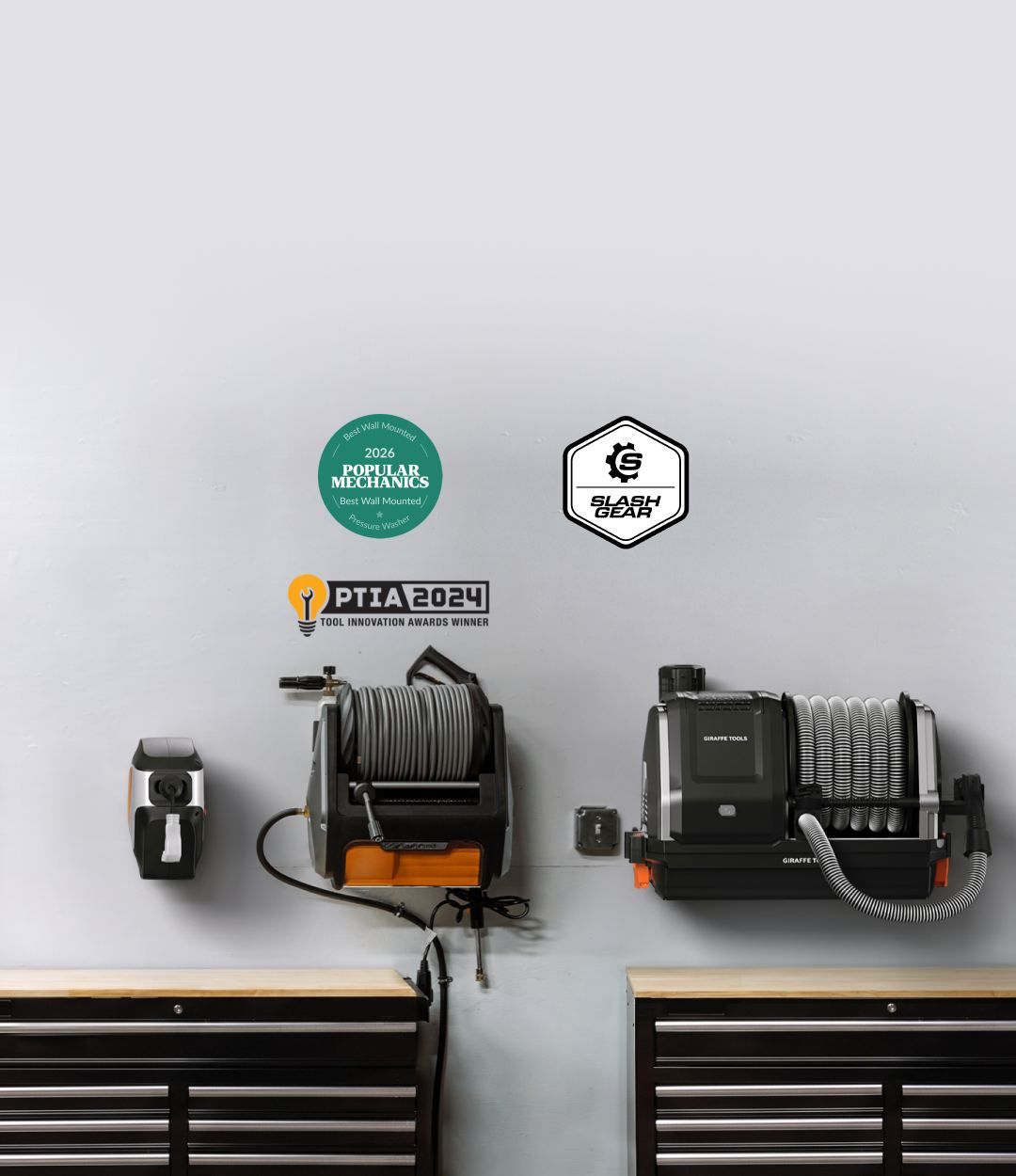 Giraffe Tools Dream Garage Bundle Banner: Two wall-mounted cordless tools, likely a hose reel and a vacuum attachment, displayed on a light gray wall above dark tool cabinets, with certification logos at the top.