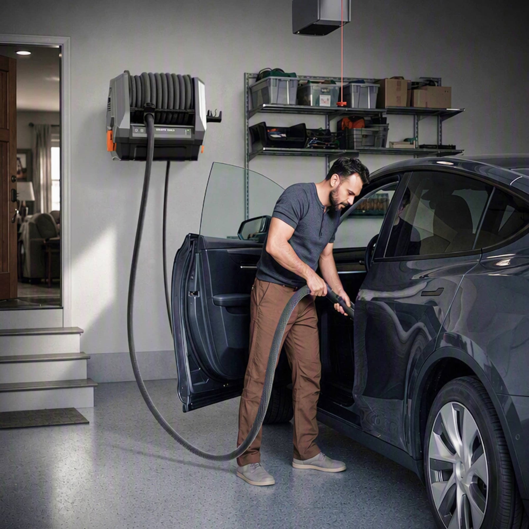 Giraffe Tools GrandFlux Retractable Vacuum Cleaner Plus Features showing car cleaning setup